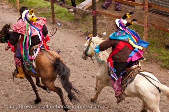 Riders wearing traditional costumes, Skach Koyl horse race, Todos Santos Cuchumatán, Huehuetenango, Guatemala