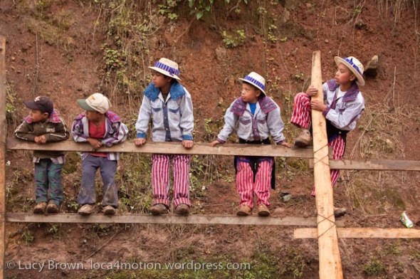 Todos Santos boys watching the race. Skach Koyl horse race, Todos Santos Cuchumatán, Huehuetenango, Guatemala