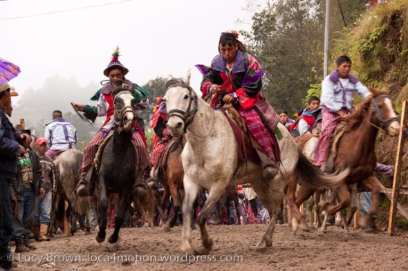Jockeys setting off from one end of the track after refueling with a mouthful of booze. Skach Koyl horse race, Todos Santos Cuchumatán, Huehuetenango, Guatemala
