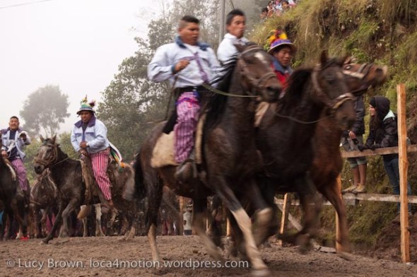 Setting off again in a mad dash. Skach Koyl horse race, Todos Santos Cuchumatán, Huehuetenango, Guatemala