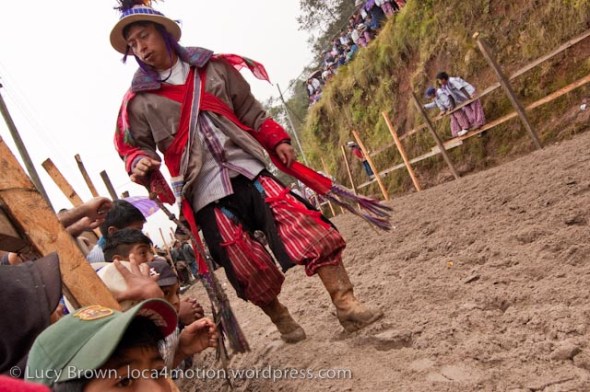 A fallen jockey gets up. Skach Koyl horse race, Todos Santos Cuchumatán, Huehuetenango, Guatemala