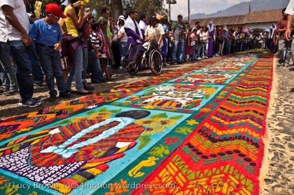 Crowds admiring the completed alfombra moments before the procession walks over it, Antigua, Guatemala
