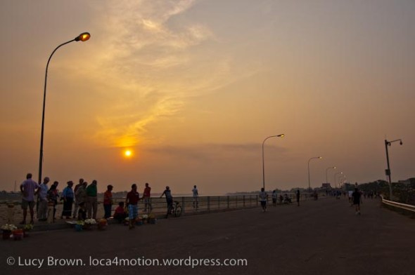 Leisure time at sunset along the Mekong riverbank, Vientiane, Laos