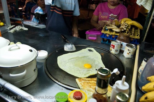 Making roti on a street cart, desserts, Thailand