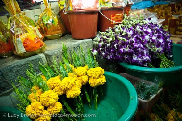 Orchid & marigold bunches & temple offerings, morning market, Krabi town, Krabi, Thailand