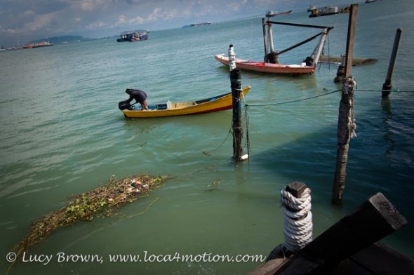 Boats at end of jetty, Chew Jetty, Clan Jetties, George Town, Penang, Malaysia