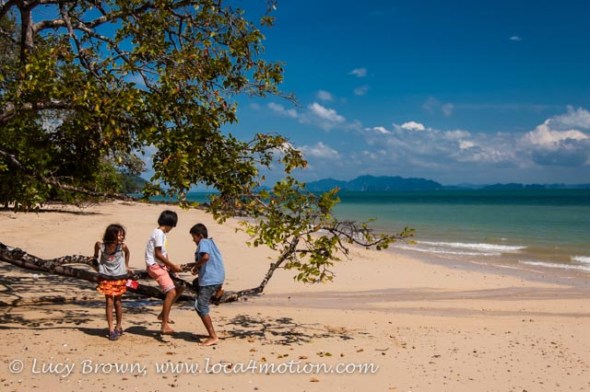 Children playing on beach, Ko Yao Noi, Phuket, Thailand