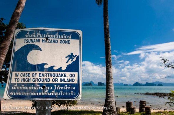 Tsunami hazard sign on beach, Ko Yao Noi, Phuket, Thailand