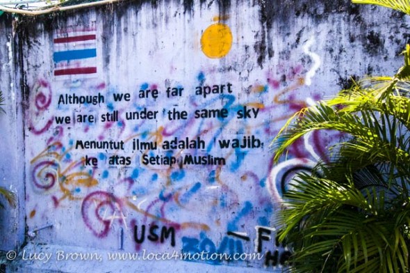 Message written on playground wall, Koh Panyee School (Ko Panyi), Phang Nga Bay, Thailand Message written on playground wall, Koh Panyee School (Ko Panyi), Phang Nga Bay, Thailand