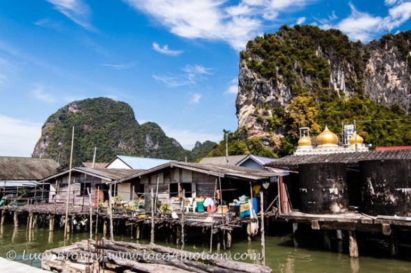 Houses on stilts and mosque, view from Koh Panyee School (Ko Panyi), Phang Nga Bay, Thailand Houses on stilts and mosque, view from Koh Panyee School (Ko Panyi), Phang Nga Bay, Thailand